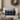 Cozy living room with a beige sofa, Harris Tweed Denim MacLeod cushion , and decorative wreath.
