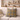 Neutral modern room with wooden shelves, ornaments, and a cream sofa with a Harris Tweed Sollas Tartan cushion